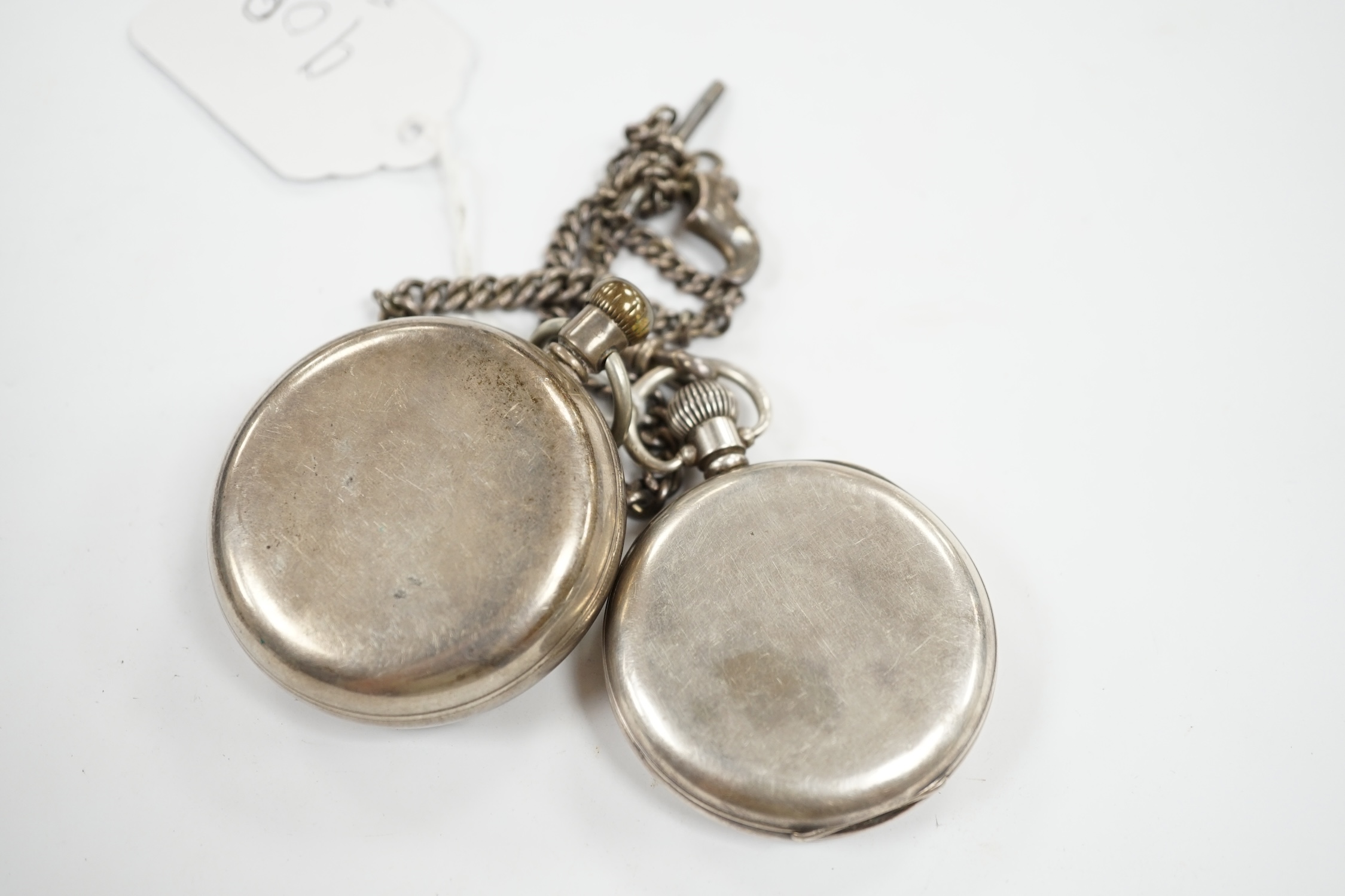 A silver open faced black dial pocket watch with a silver albert, together with a silver Waltham open face pocket watch, with Roman dial. Condition - poor to fair